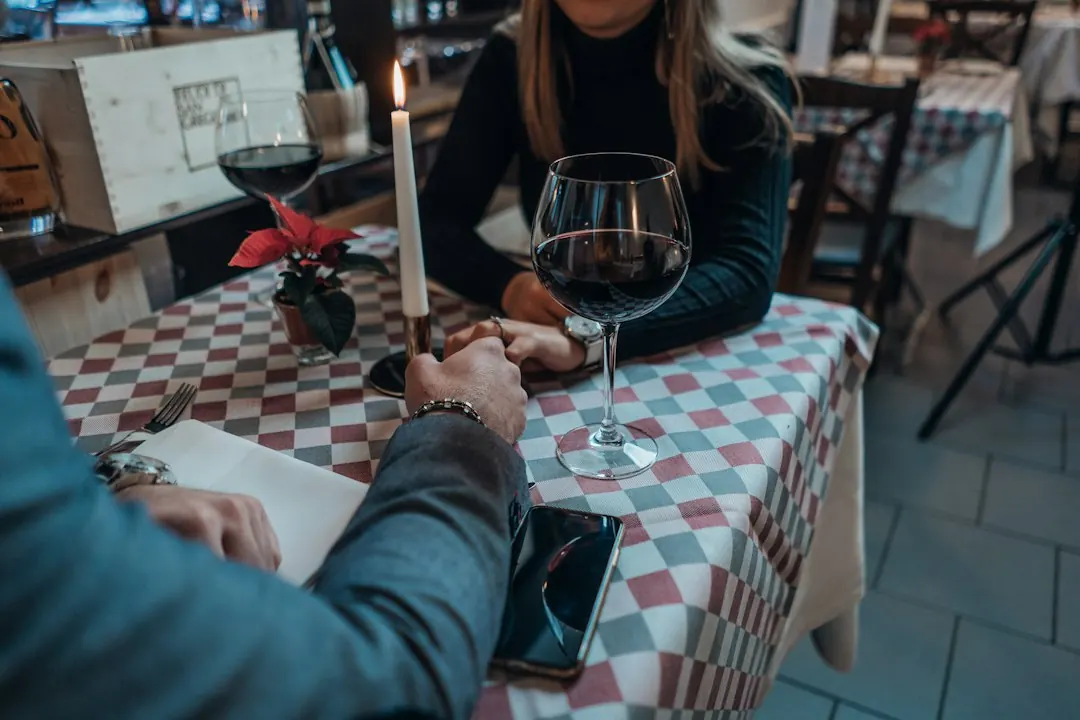 A candlelit table with relaxed conversation