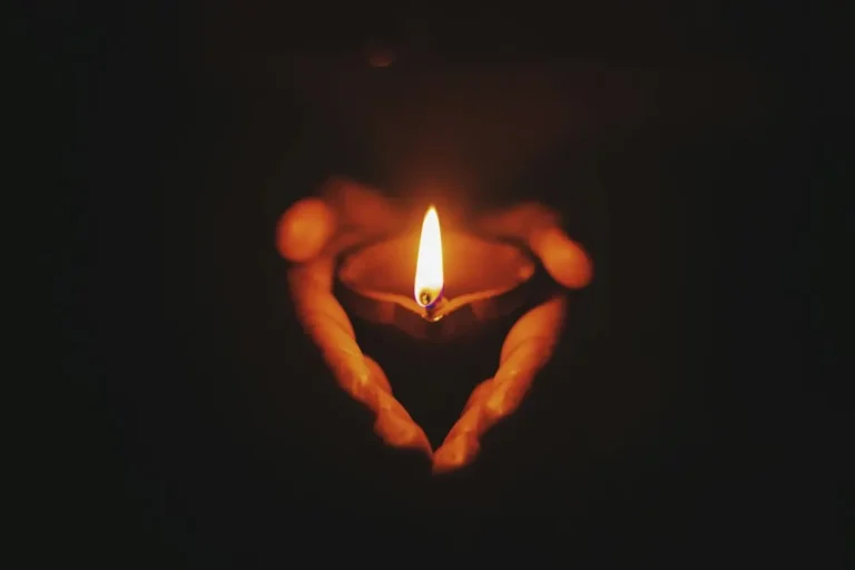 A heart and warm candlelight, representing emotional connection