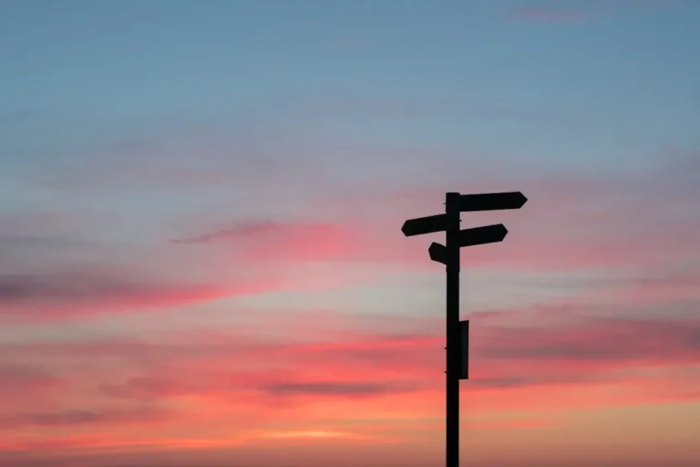 A signpost pointing in two directions